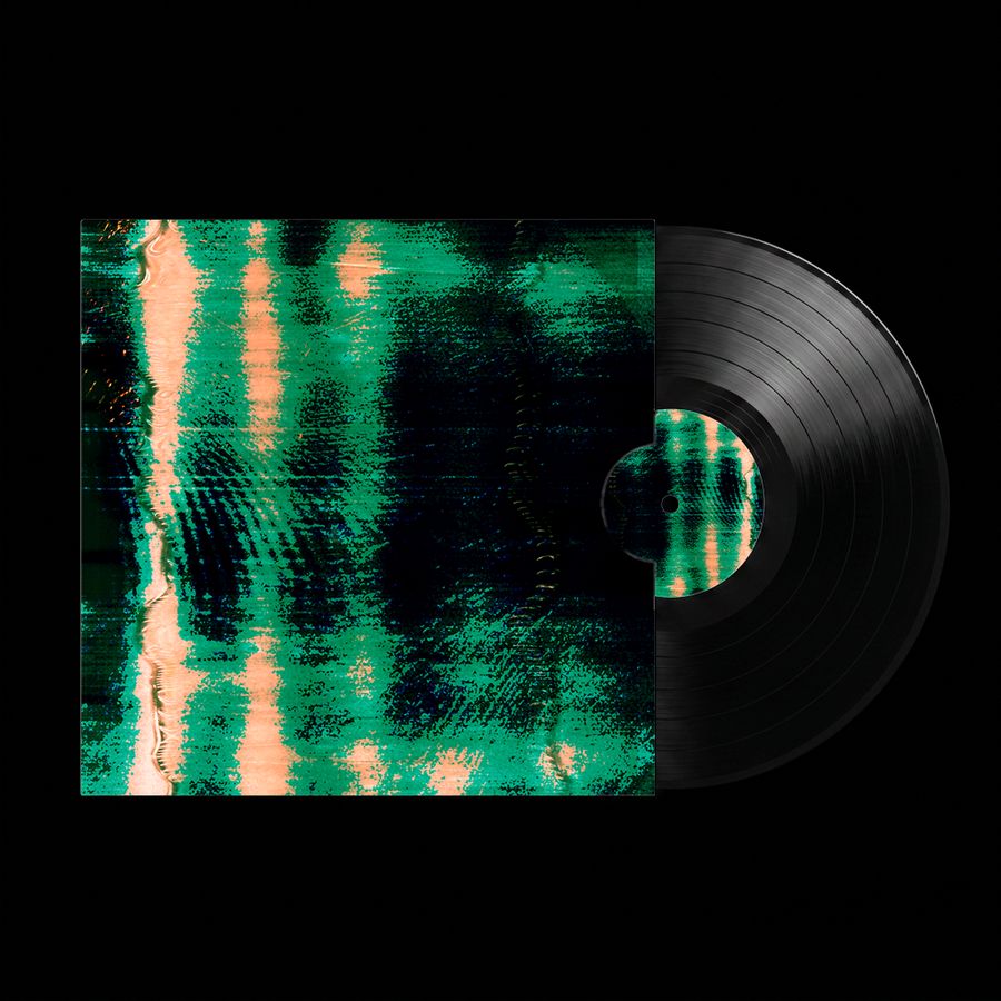 Record sleeve with green and pink vertical smears next to a black vinyl.